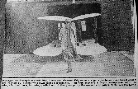 Lady Mary Heath Pulling Plane from garage